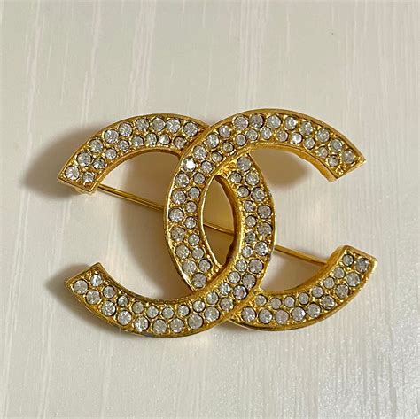 chanel brooch on clothes|most popular Chanel brooch.